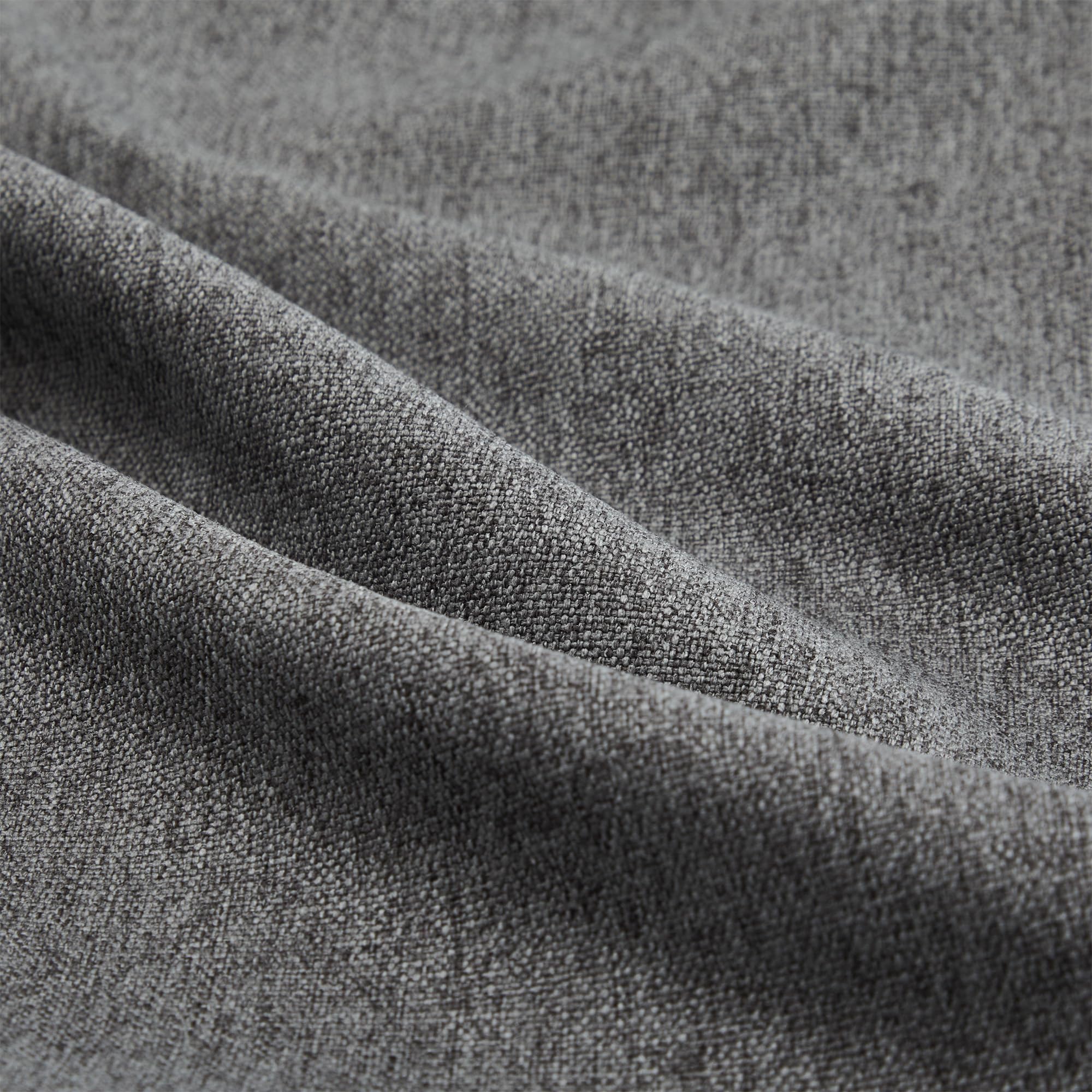 Sofá en L gris oscuro con cama y almacenamiento